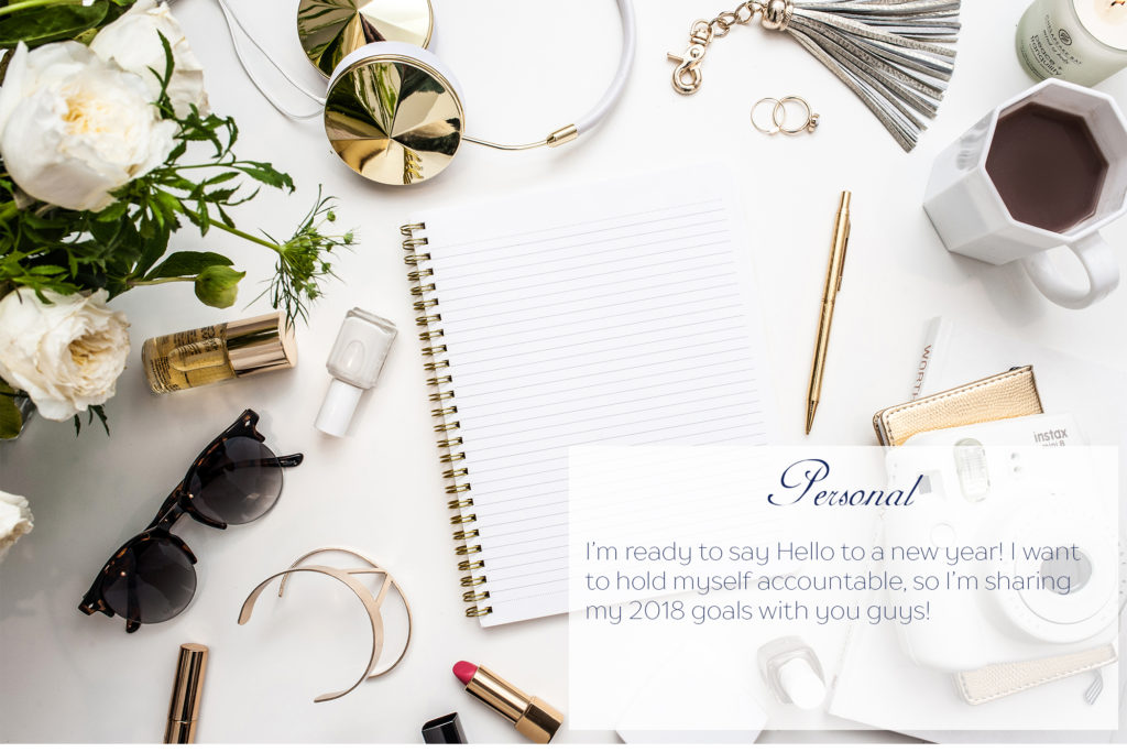 lay flat with notebook, makeup, gold accessories