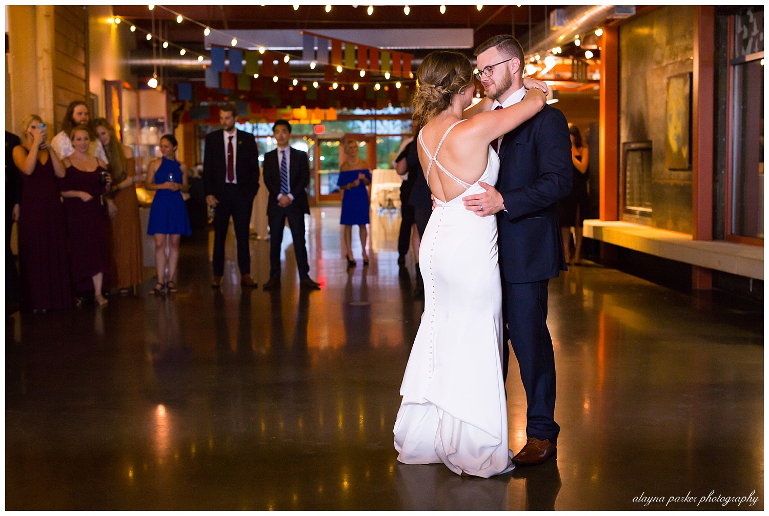 bride and groom share first dance at grange insurance audubon center