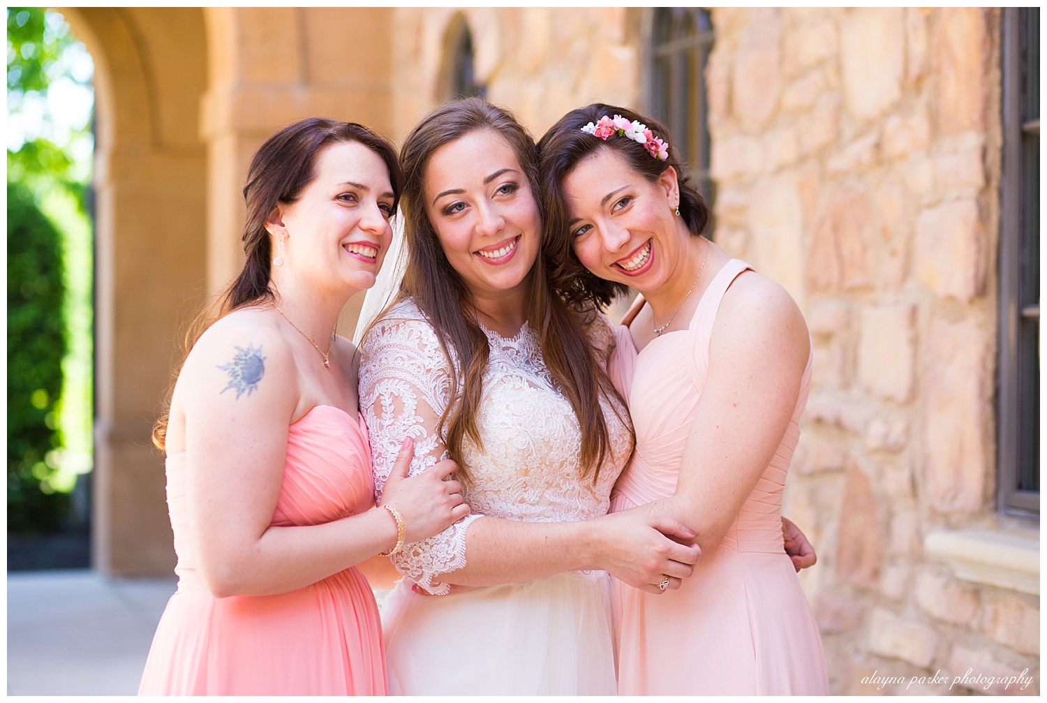 bride and bridesmaid's hugging