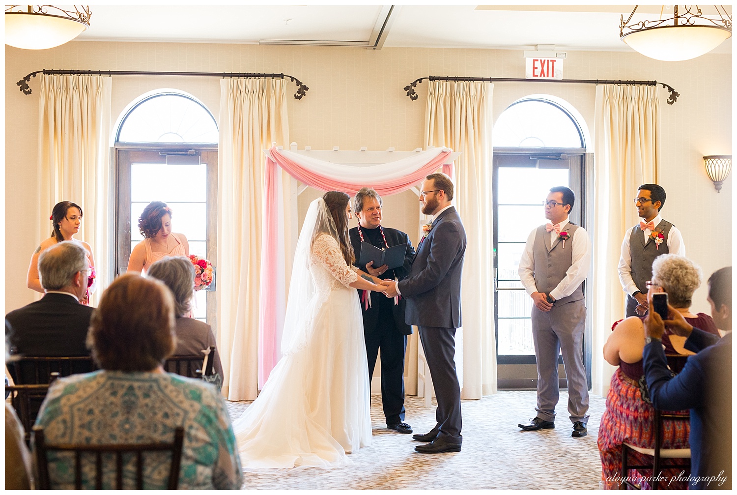 bride and groom at altar inside club at corazon