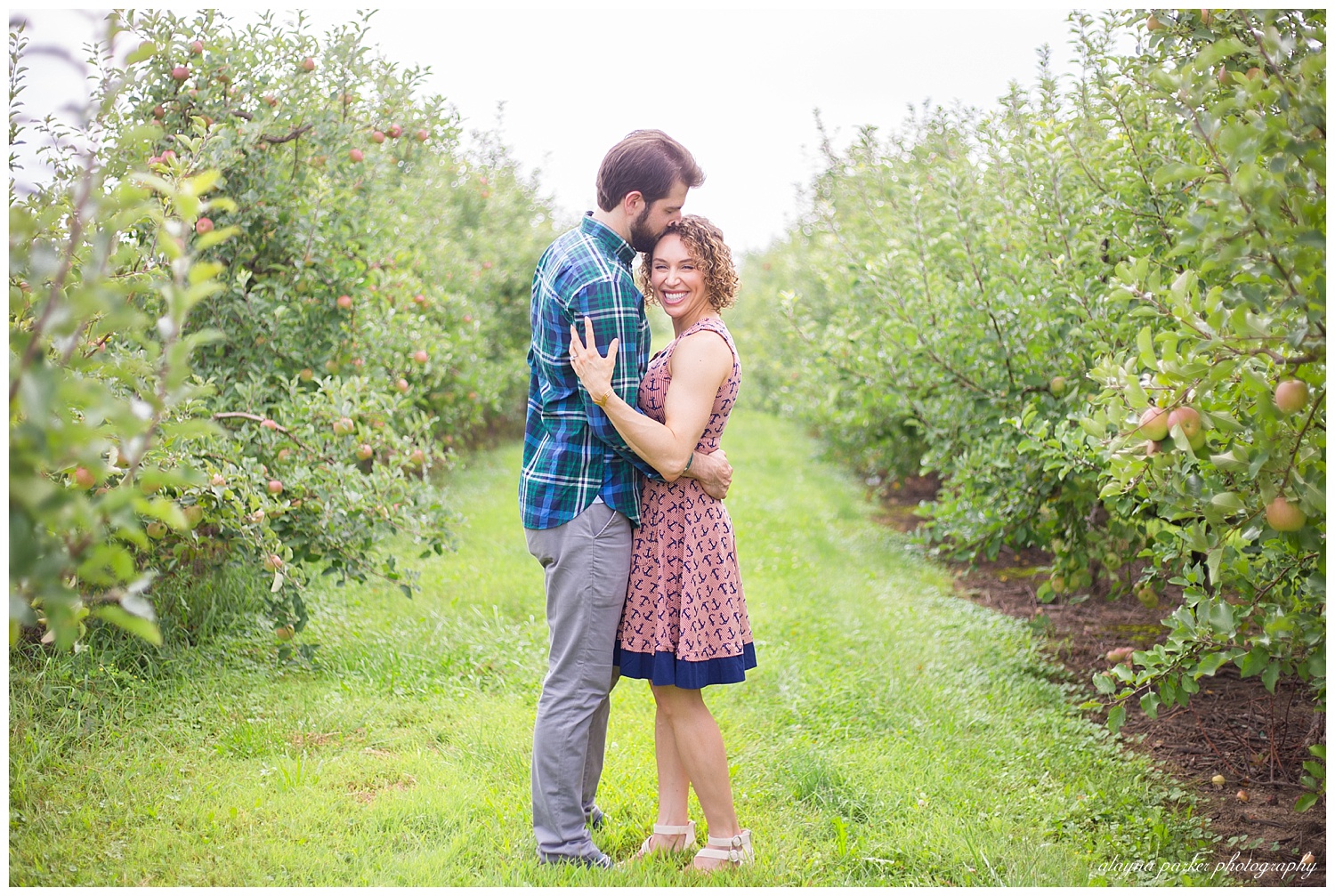 woman laughing while man looks at her