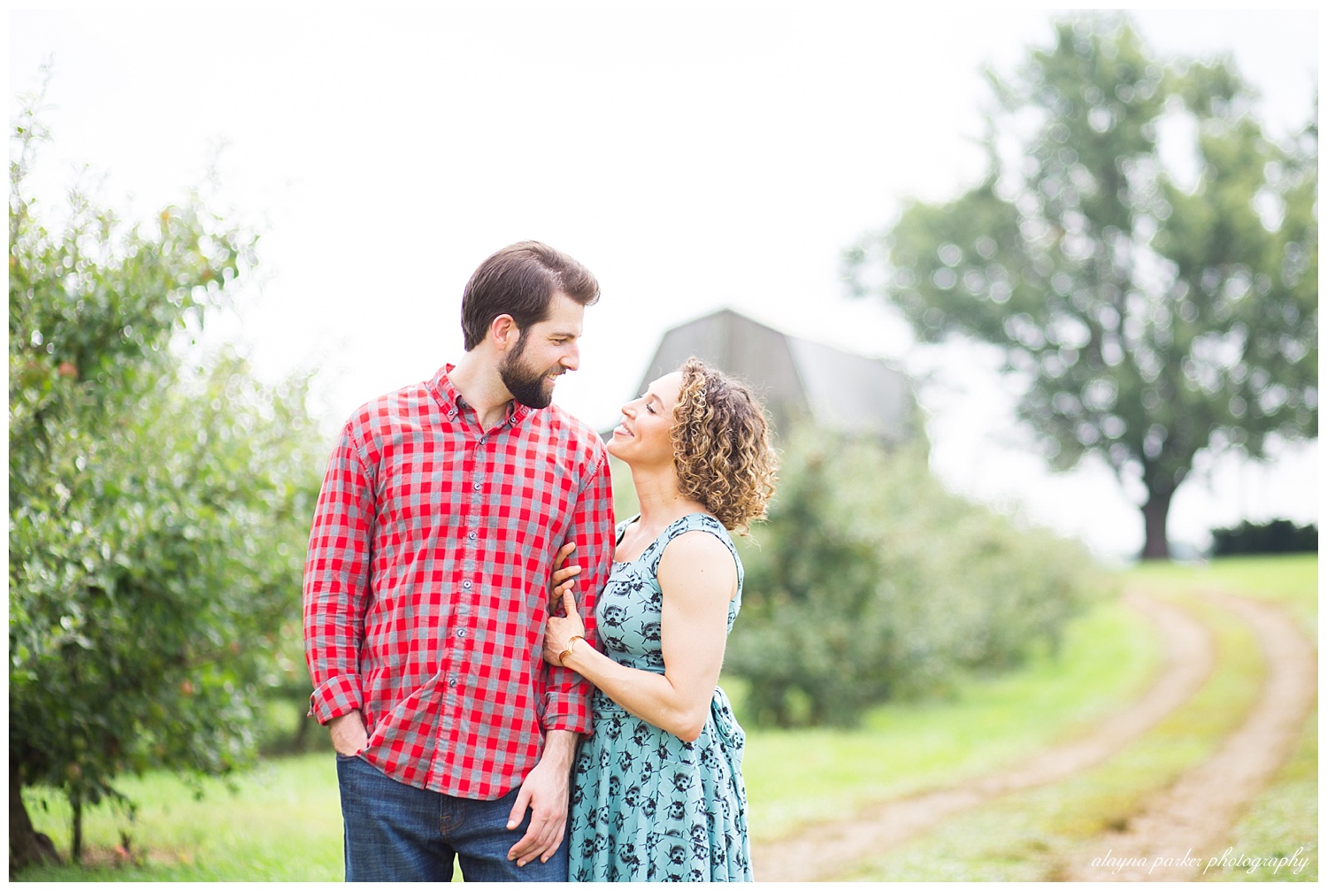 man and woman looking at each other at lynds fruit farm