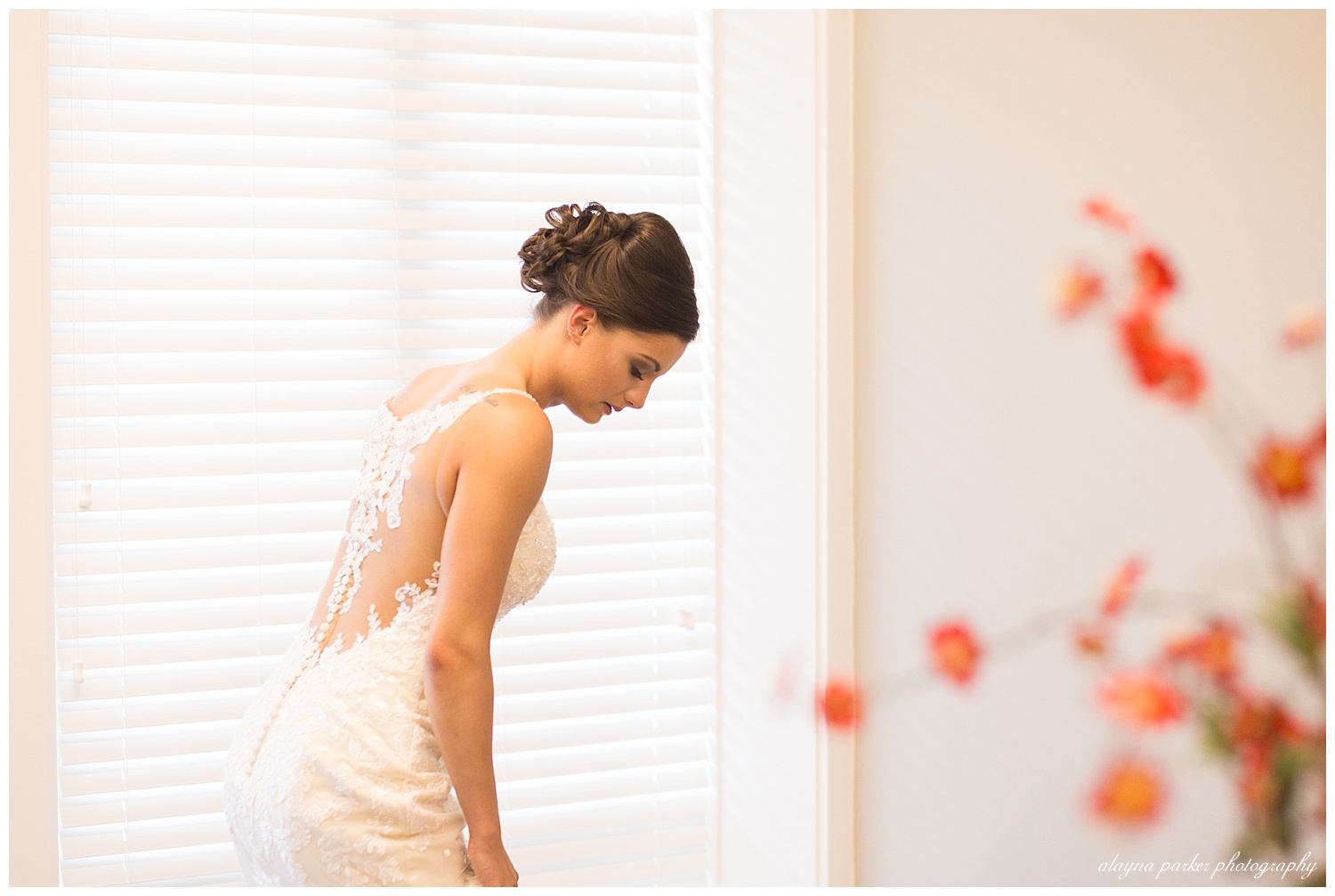 bride getting shoes on