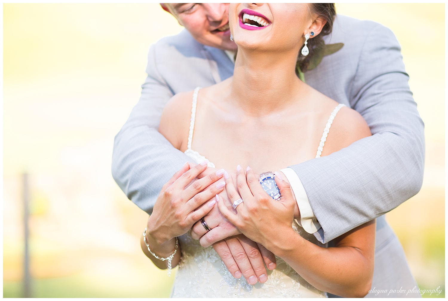 close up of bride laughing and groom smiling at bride at south pointe golf club