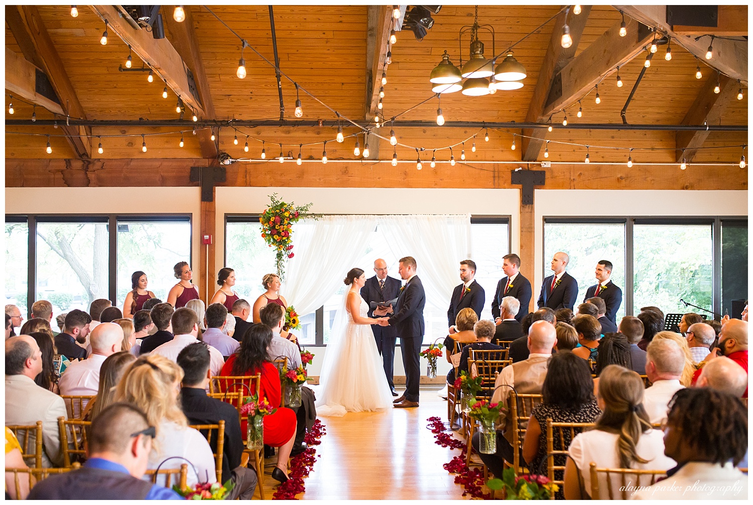 indoor wedding ceremony at water's edge