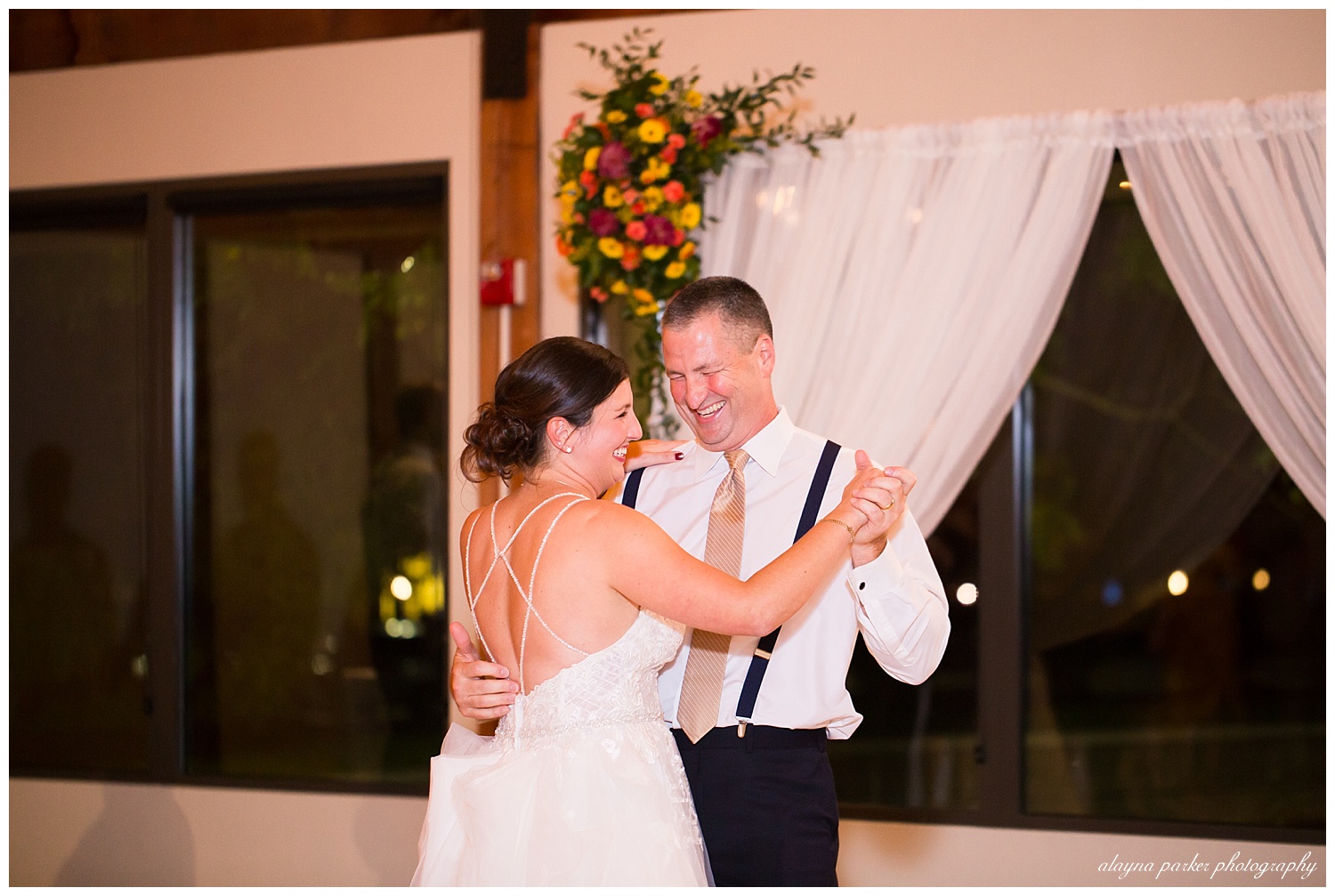father daughter dance at water's edge
