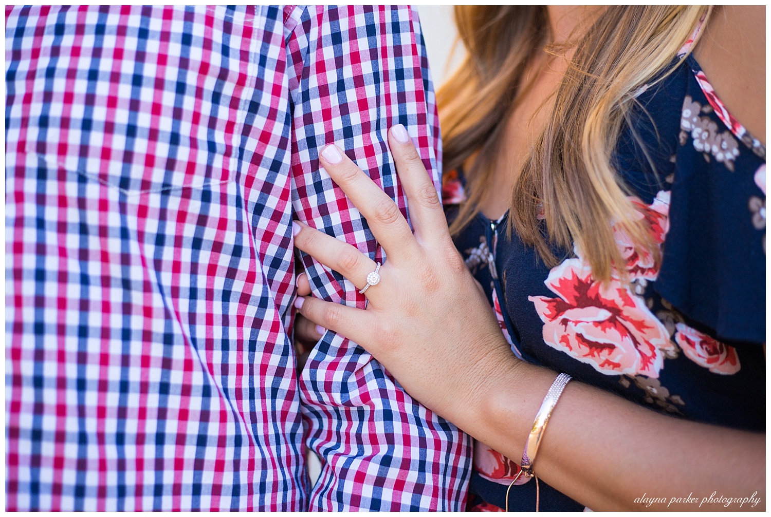 close up of platinum halo engagement ring