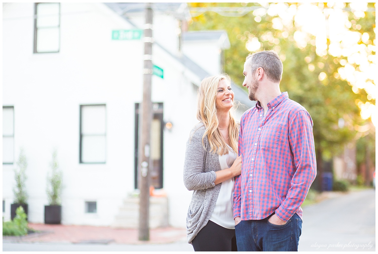 woman smiling big at man in german village