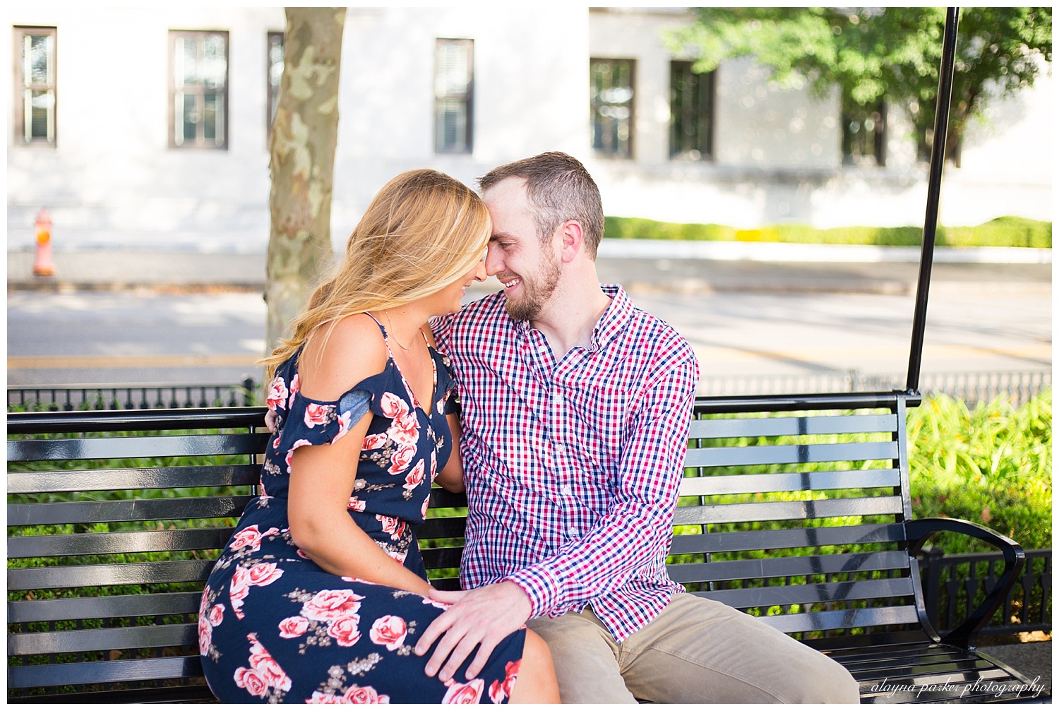 man and woman touching foreheads and smiling at scioto mile