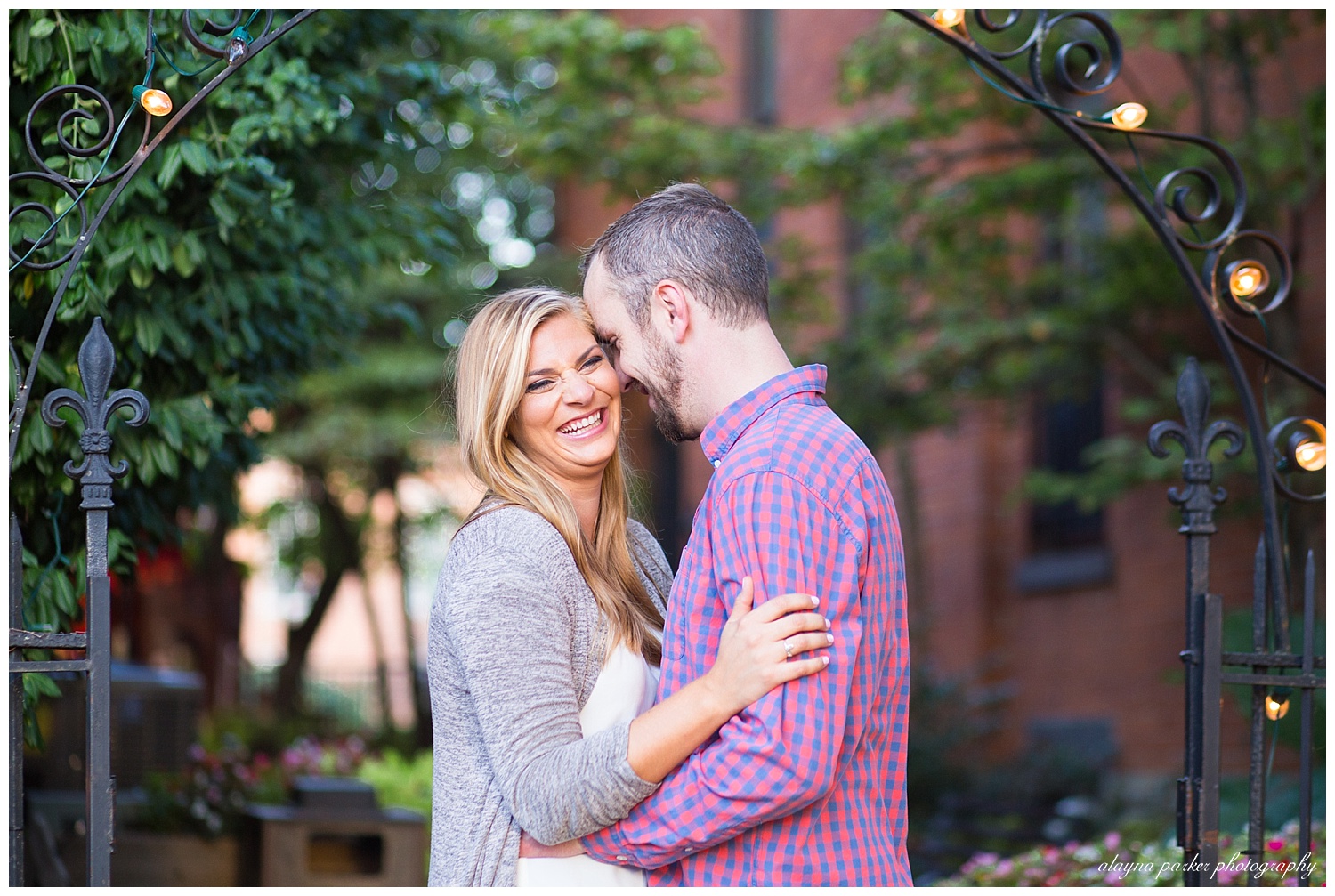 woman laughing and man smiling by book loft in german village