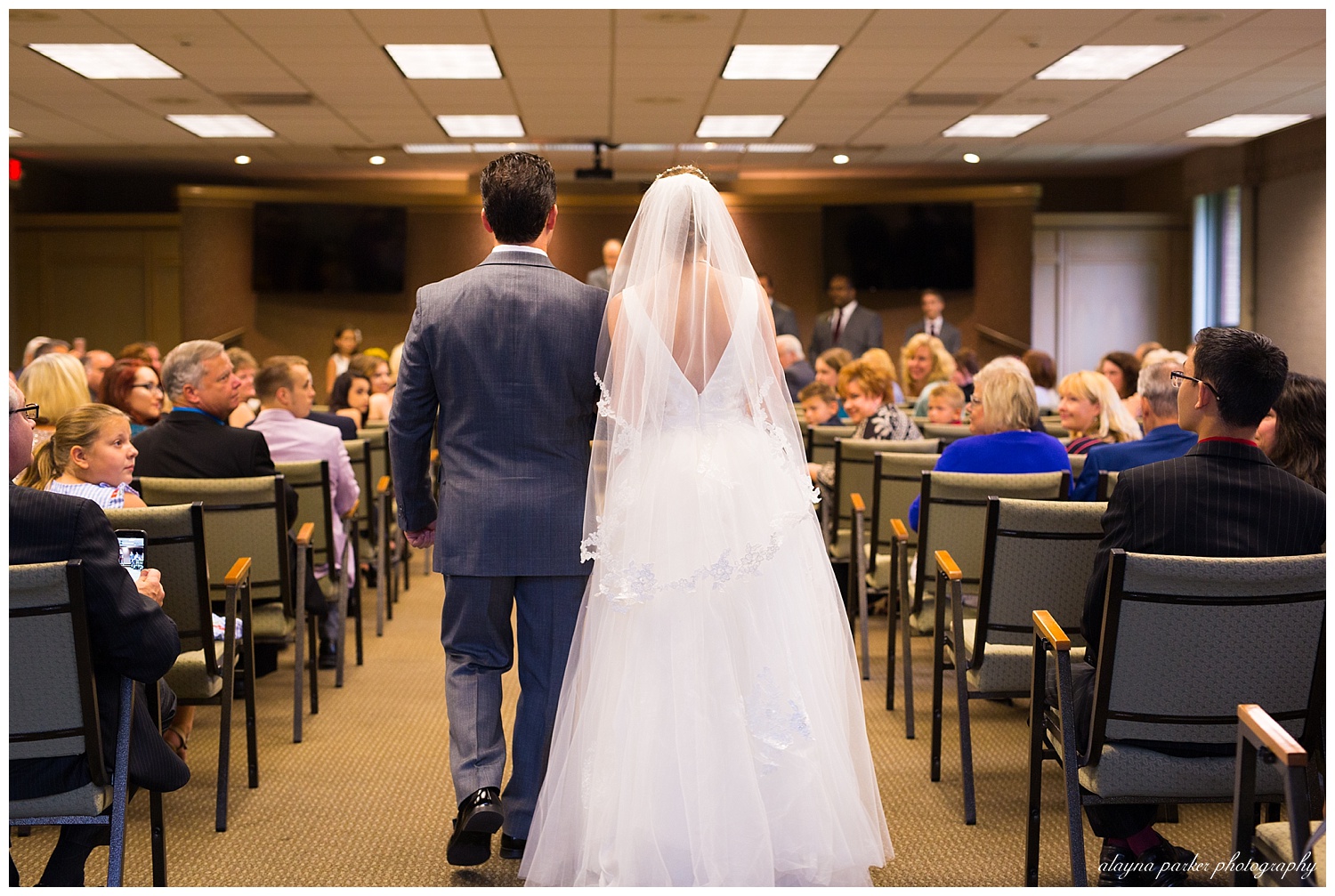 father walking daughter down the aisle
