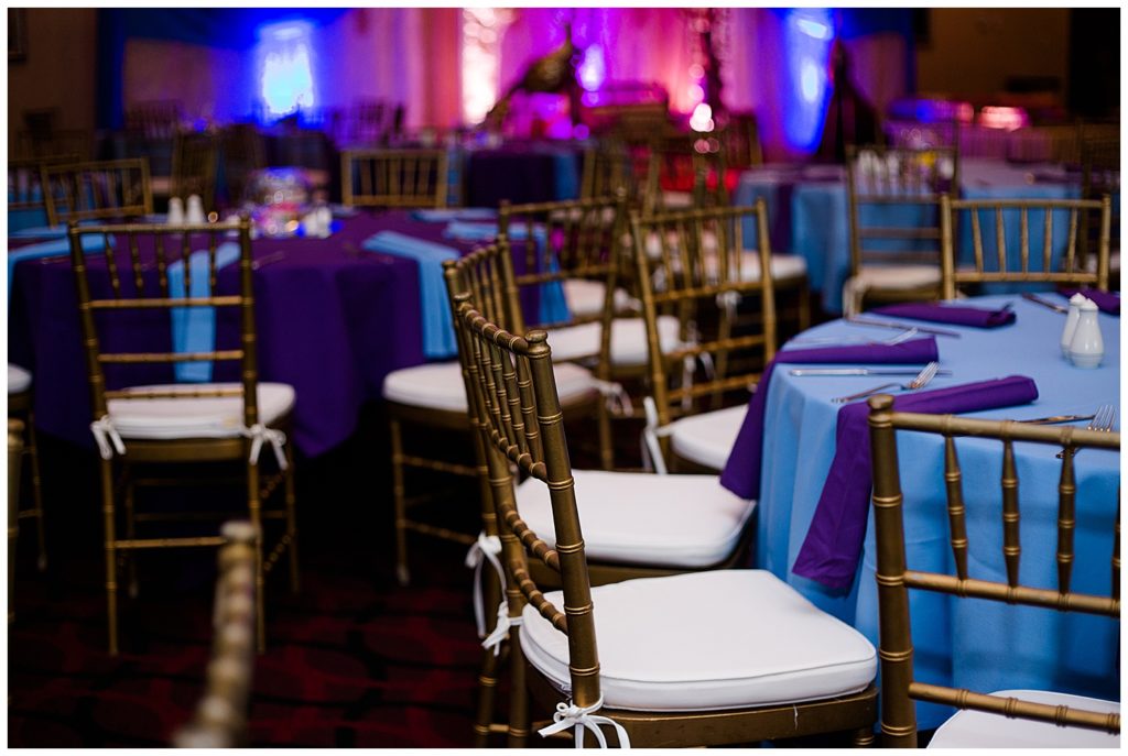 round tables with blue and purple tablecloths at bertram inn