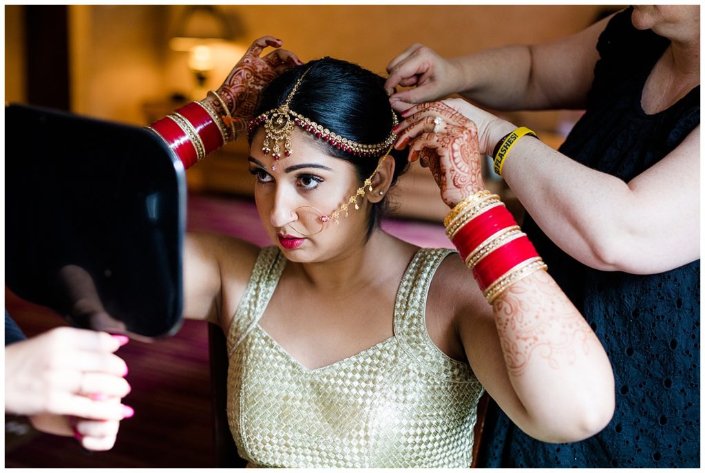bride putting in nose ring