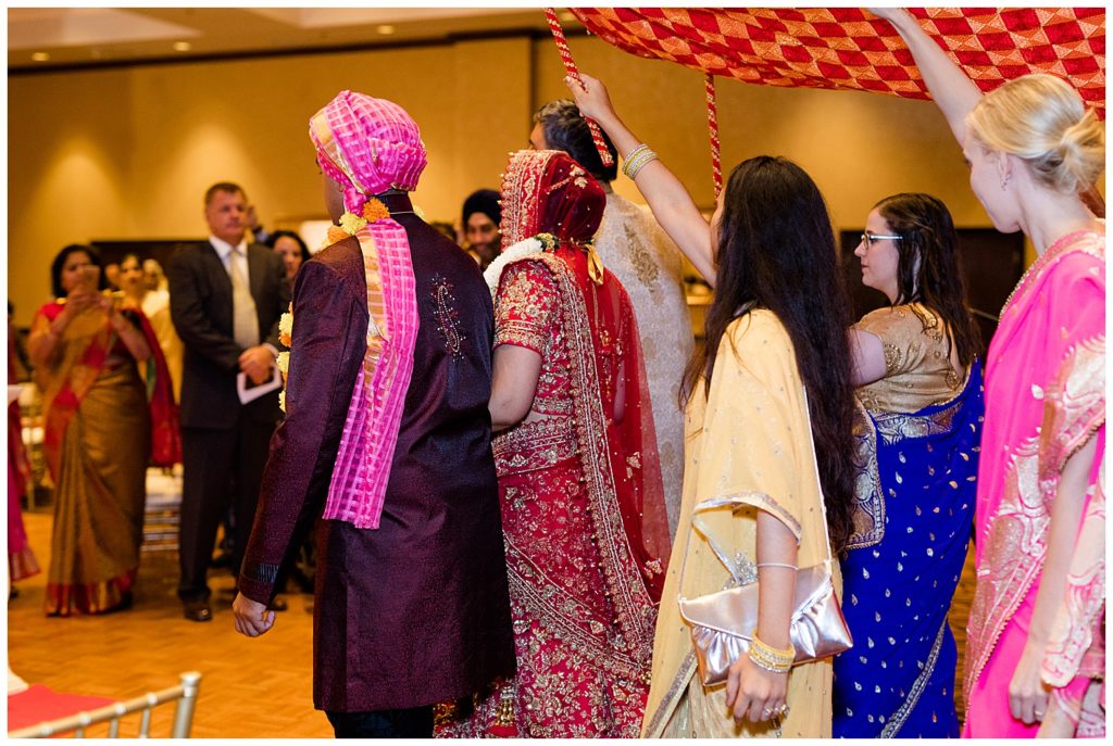 indian bride walks in for traditional hindu ceremony