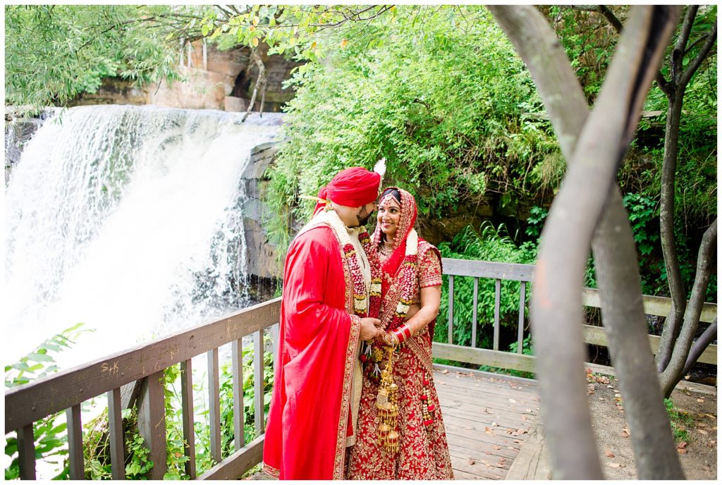indian bride and groom looking at each other at chagrin falls