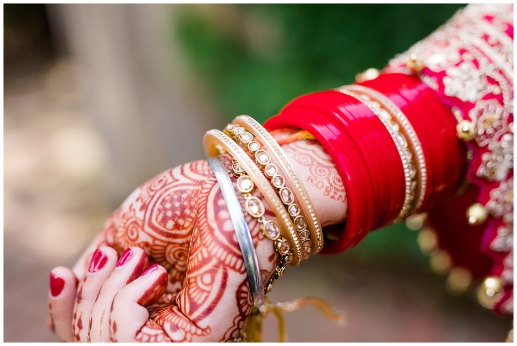 groom's name in henna tattoo on bride