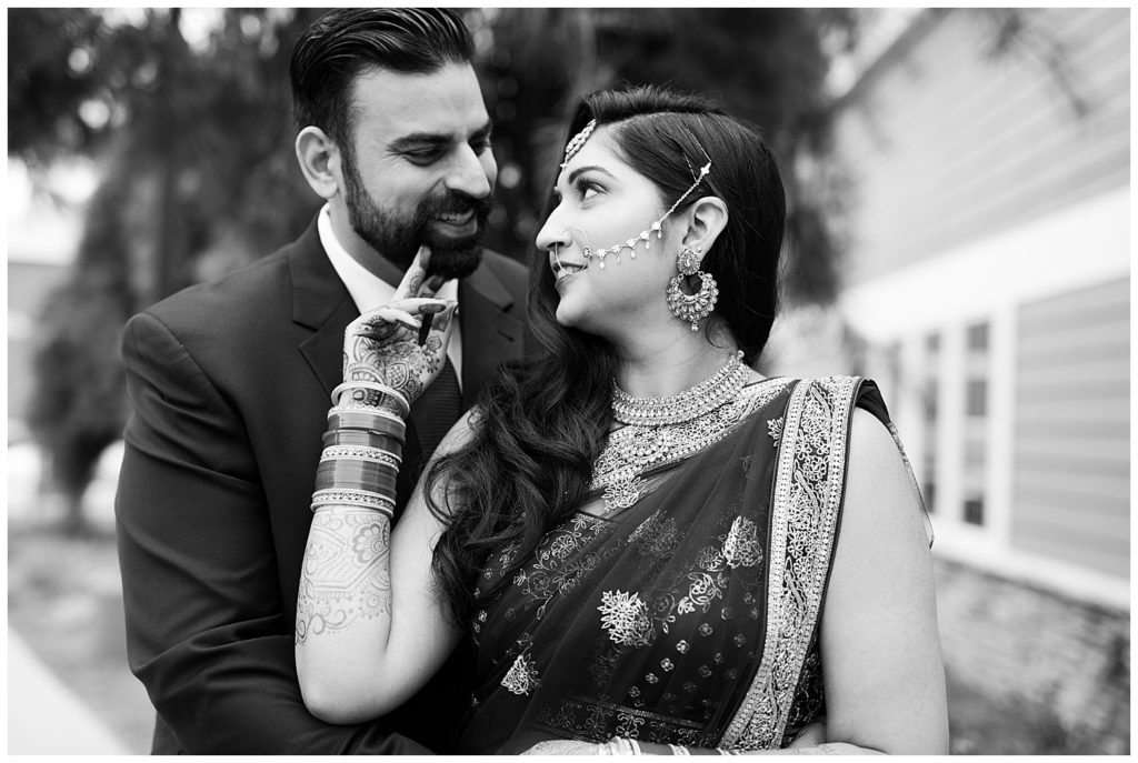 black and white image of indian bride and groom at bertram inn