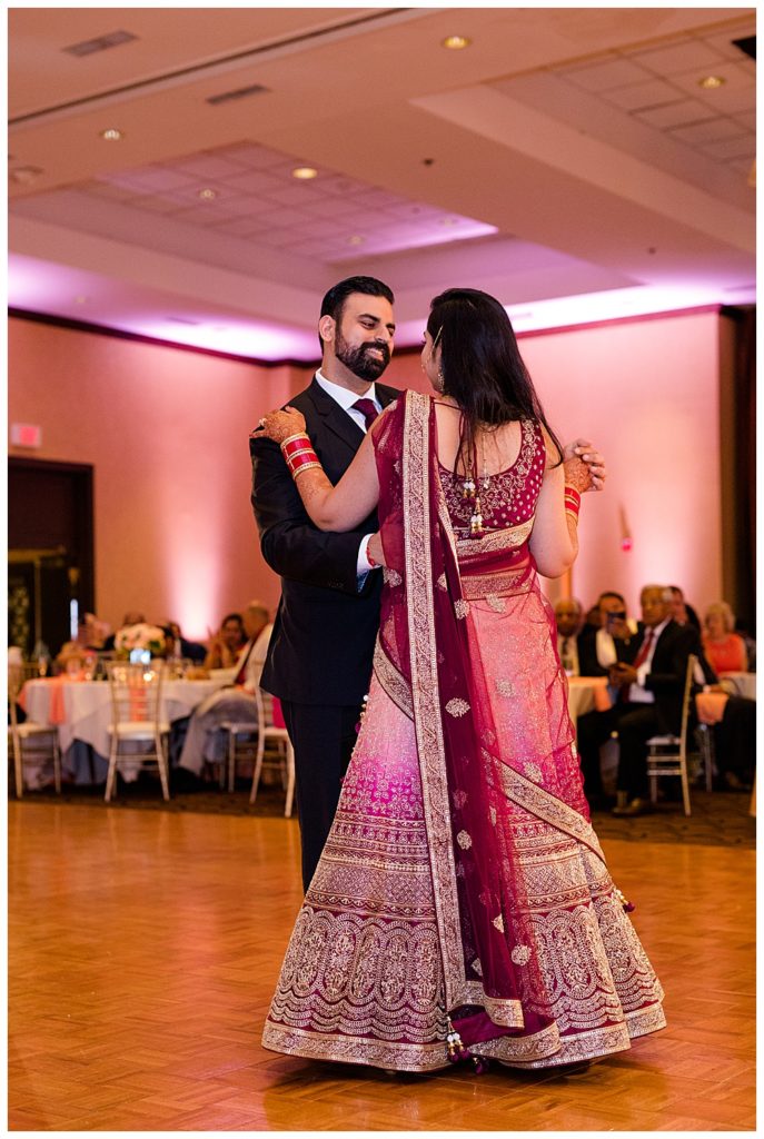 indian bride and groom share first dance at bertram inn