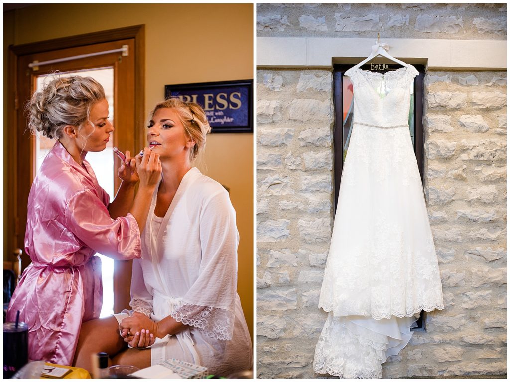 bride getting makeup touched up by makeup artist