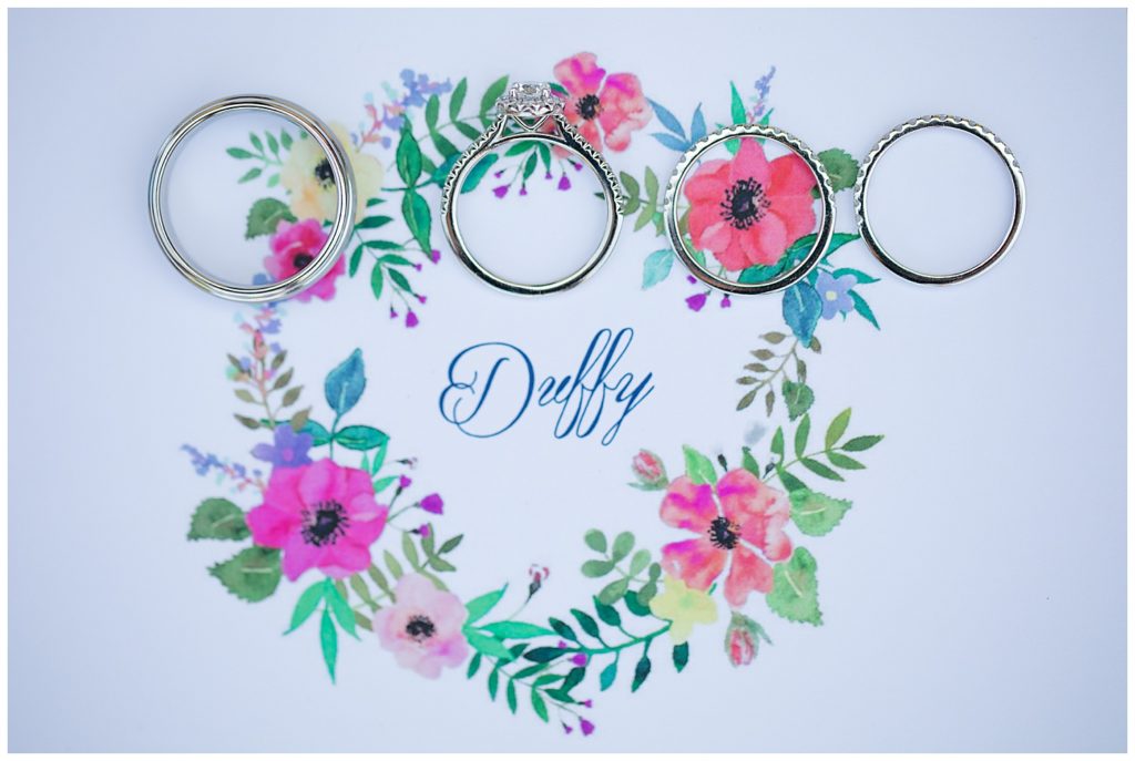 wedding bands laying on custom thank you card design