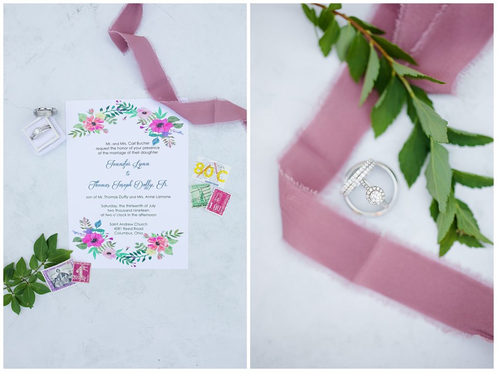wedding invitation and vintage stamps on marble background