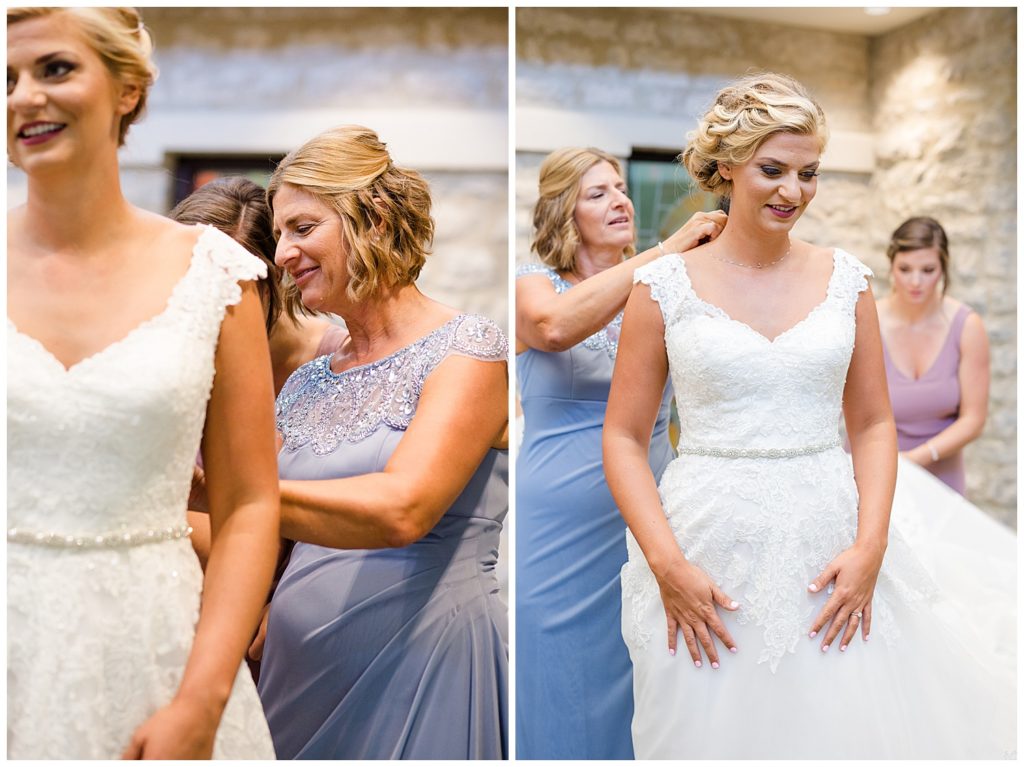 mother putting necklace on bride