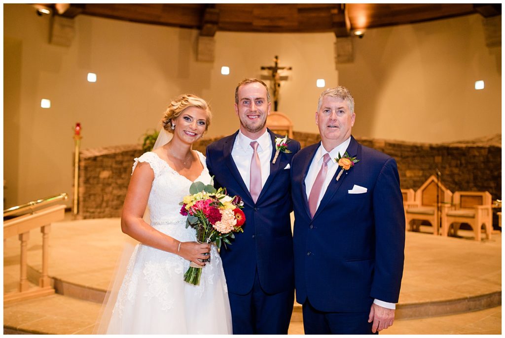 bride and groom with groom's father