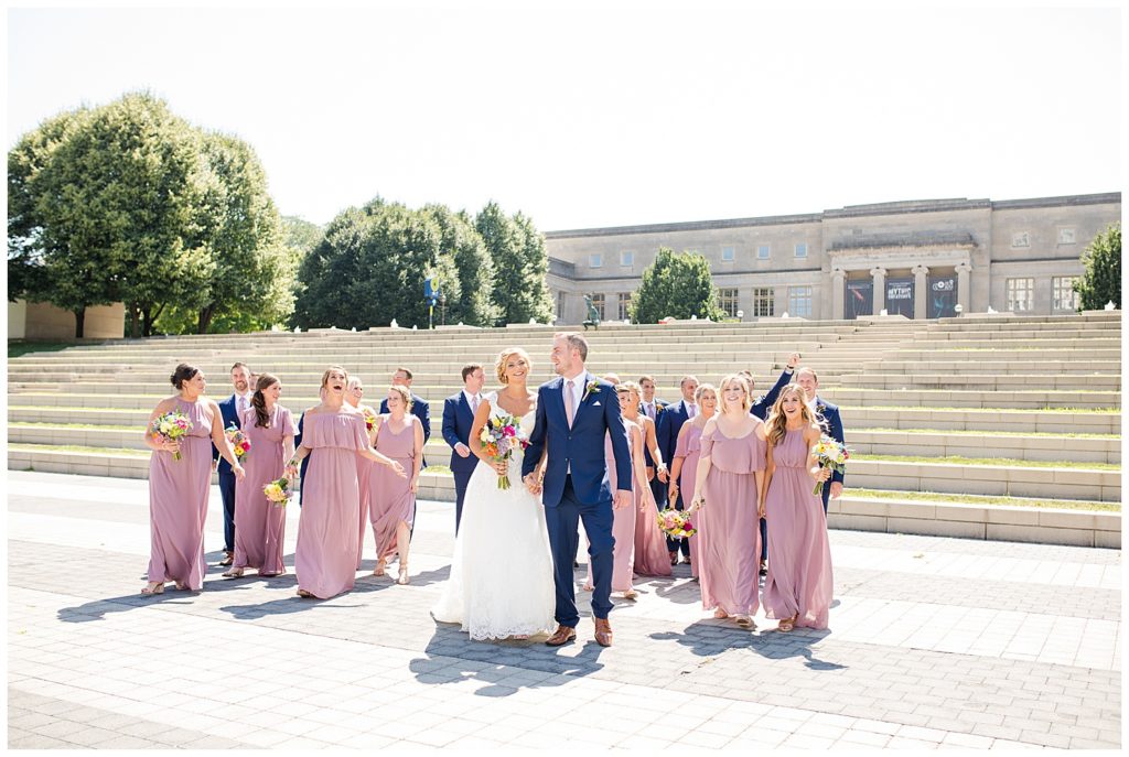 bridal party walking in front of steps at cosi