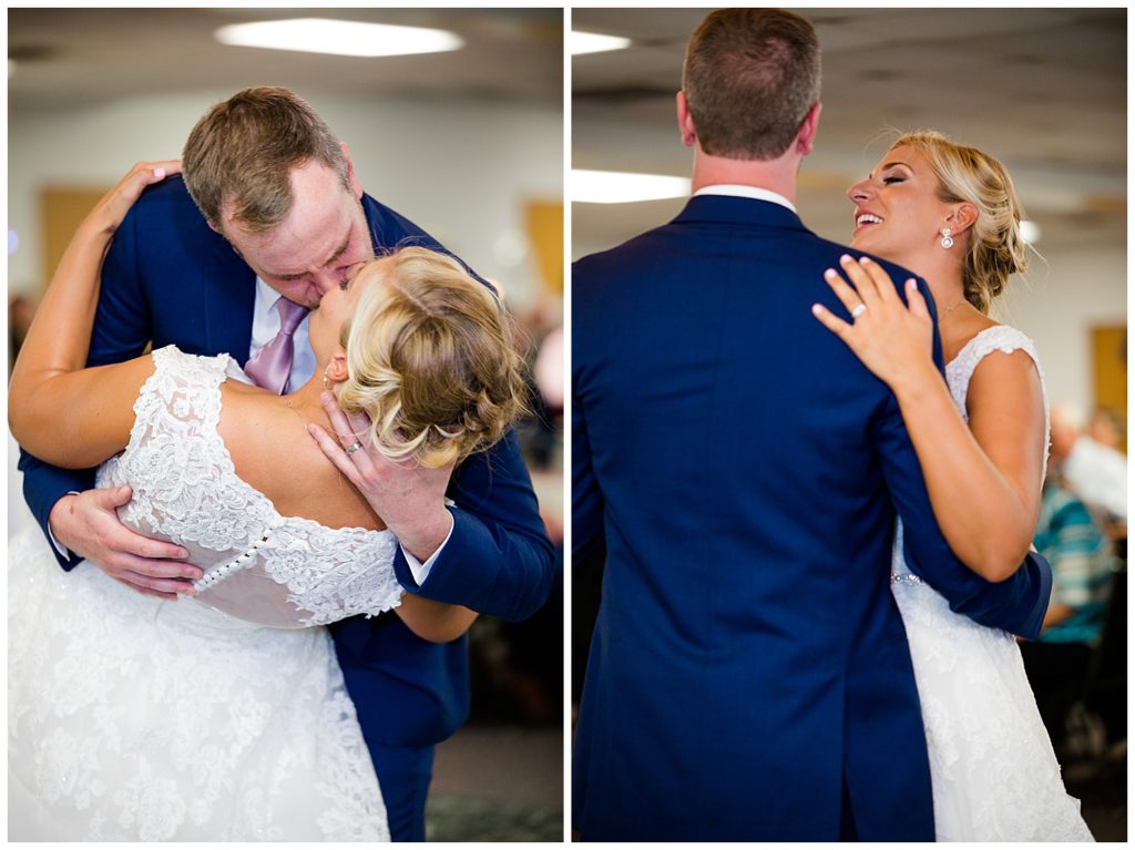 groom dips bride and kisses her during first dance