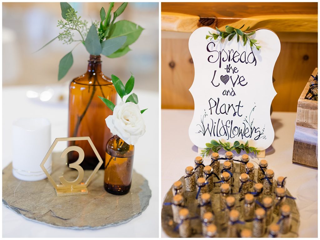 amber glass bottles with white roses and eucalyptus sprigs