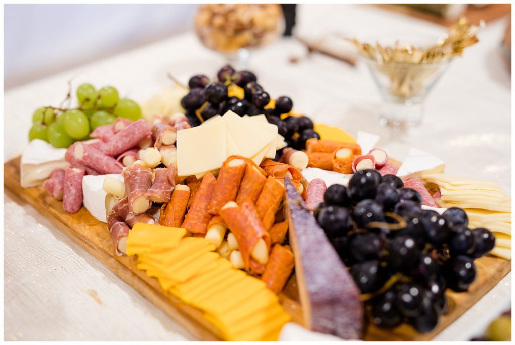 A picture of a delicious tray arranged with hors d'oeuvres at the wedding reception at the Cedar Grove Lodge venue in Hocking Hills, Ohio by Columbus wedding photographer, Alayna Parker Photography