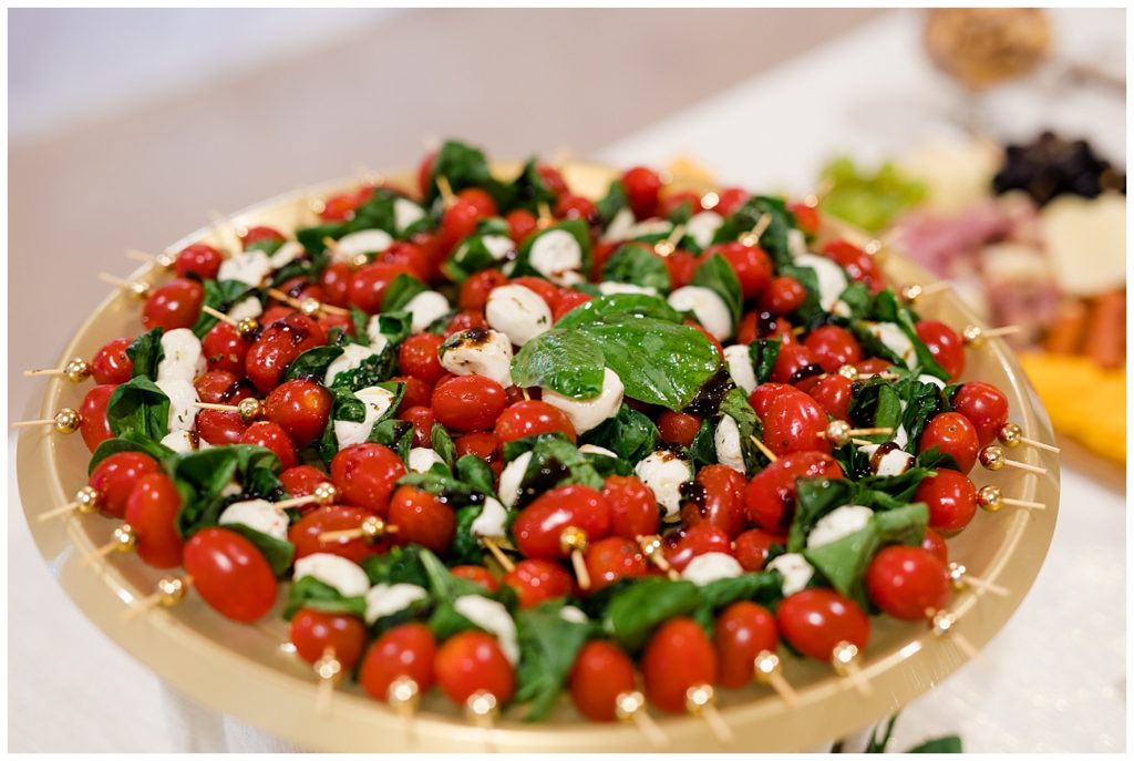 An image of a closeup of a tray of delicious hors d'oeuvres at the wedding reception at the Cedar Grove Lodge wedding venue by Columbus Ohio wedding photographer, Alayna Parker Photography