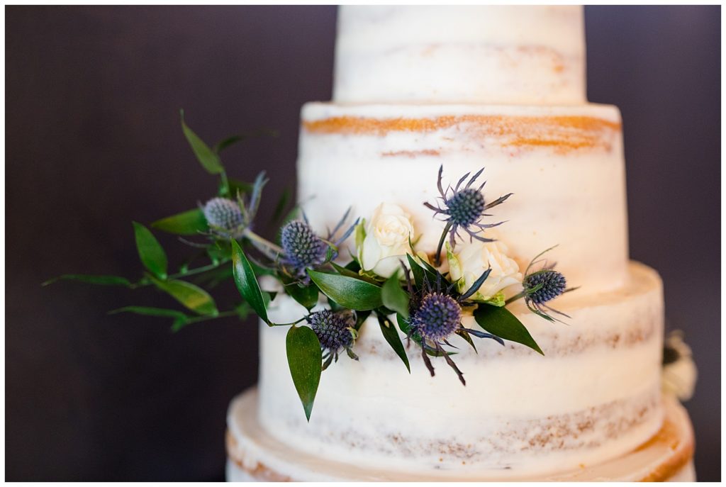 floral accents on naked cake at jorgensen farms oak grove