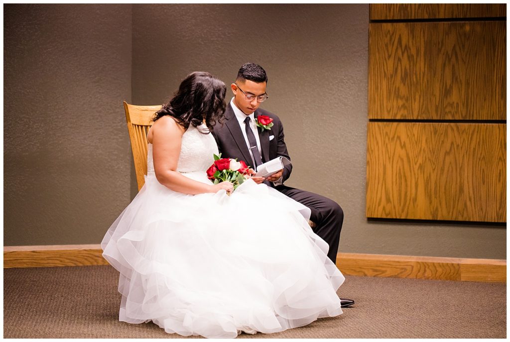 bride and groom reading bible at kingdom hall