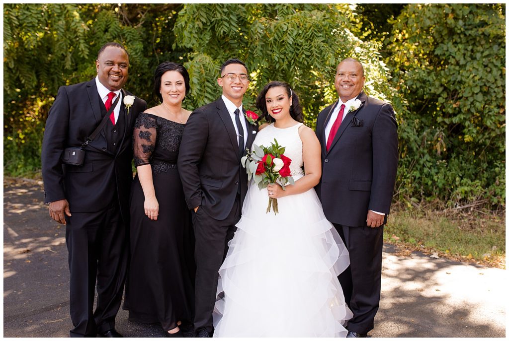 bride and groom with bride's parents