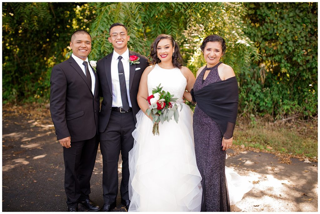 bride and groom with groom's parents