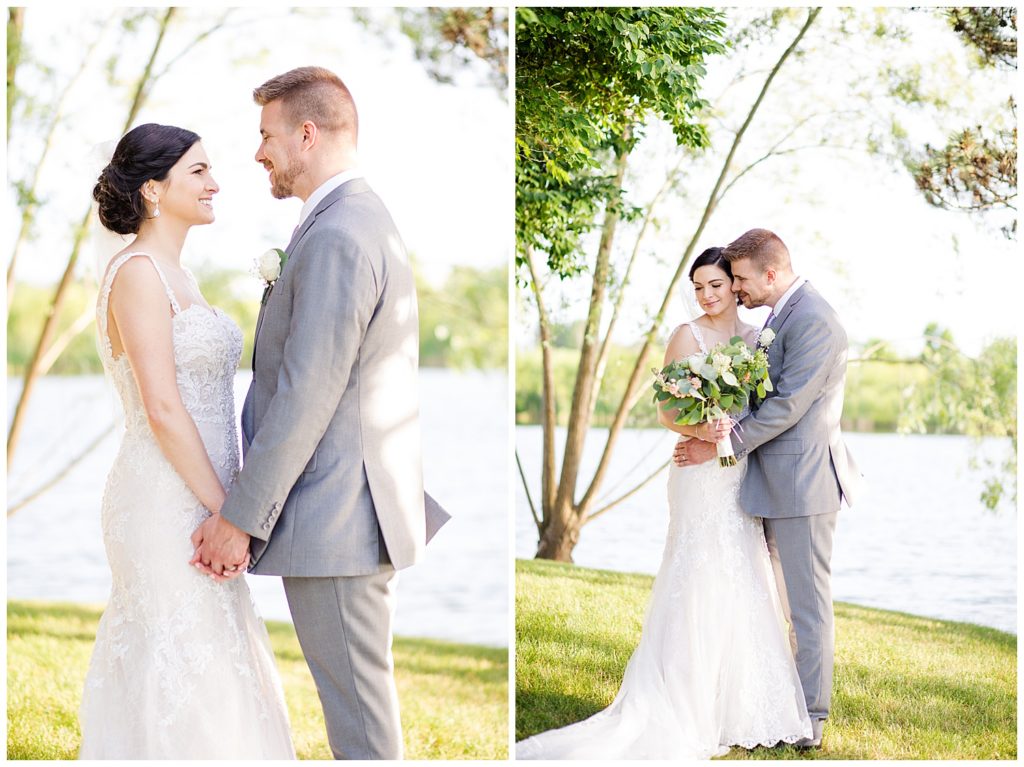 bride and groom holding hands and looking at each other at watersedge in hilliard