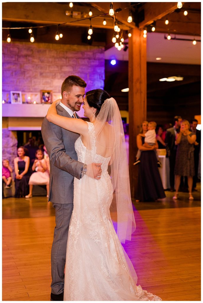 bride and groom share first dance at watersedge in hilliard