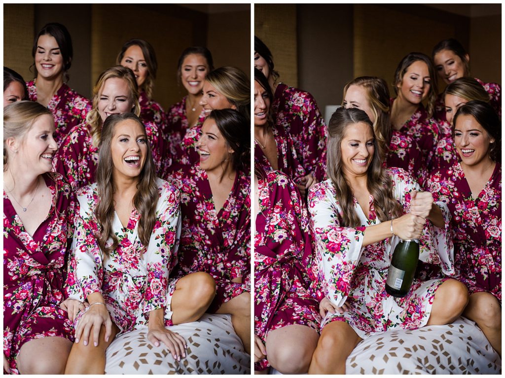 A picture of a bride and her bridesmaids laughing together in their matching robes before getting dressed for the wedding by Columbus wedding photographer, Alayna Parker Photography