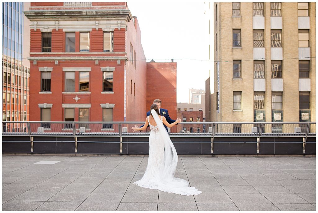 bride and groom on rooftop at renaissance hotel