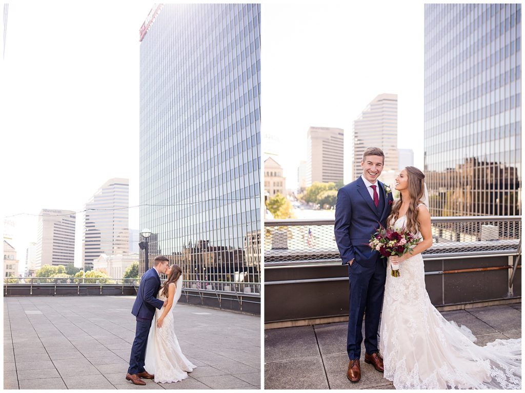 groom laughing at camera while bride looks at groom on rooftop at renaissance hotel
