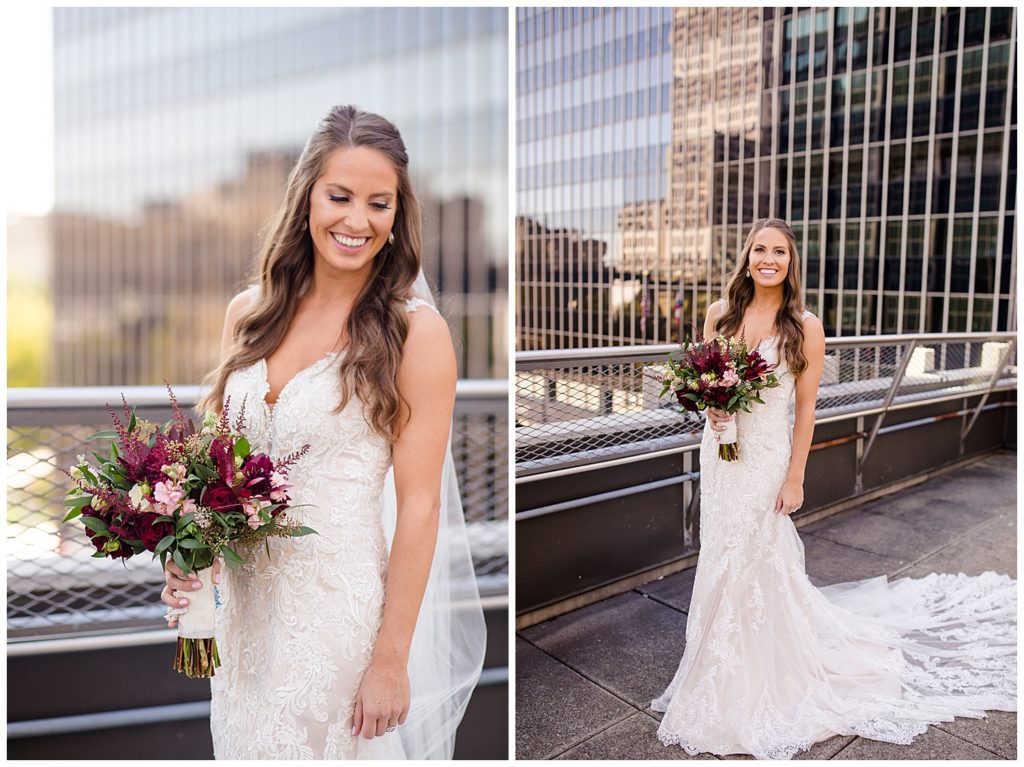 bride in lace sleeveless dress holding bouquet on rooftop at renaissance hotel
