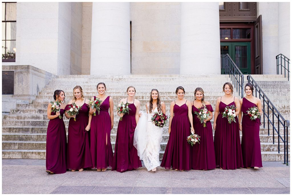 bride and bridesmaids walking outside ohio statehouse