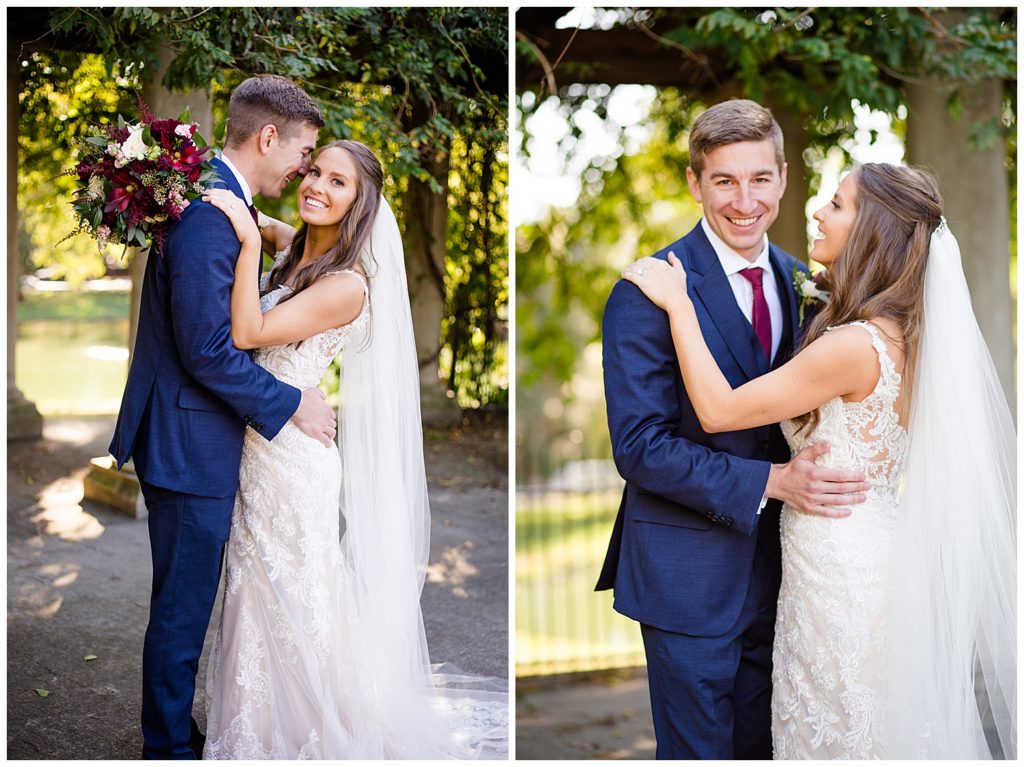 groom smiling at camera while bride smiles at groom at schiller park in german village