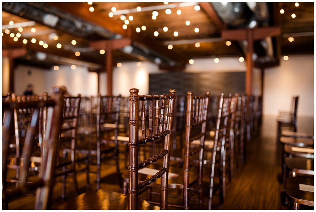 close up of brown ceremony chairs at copius