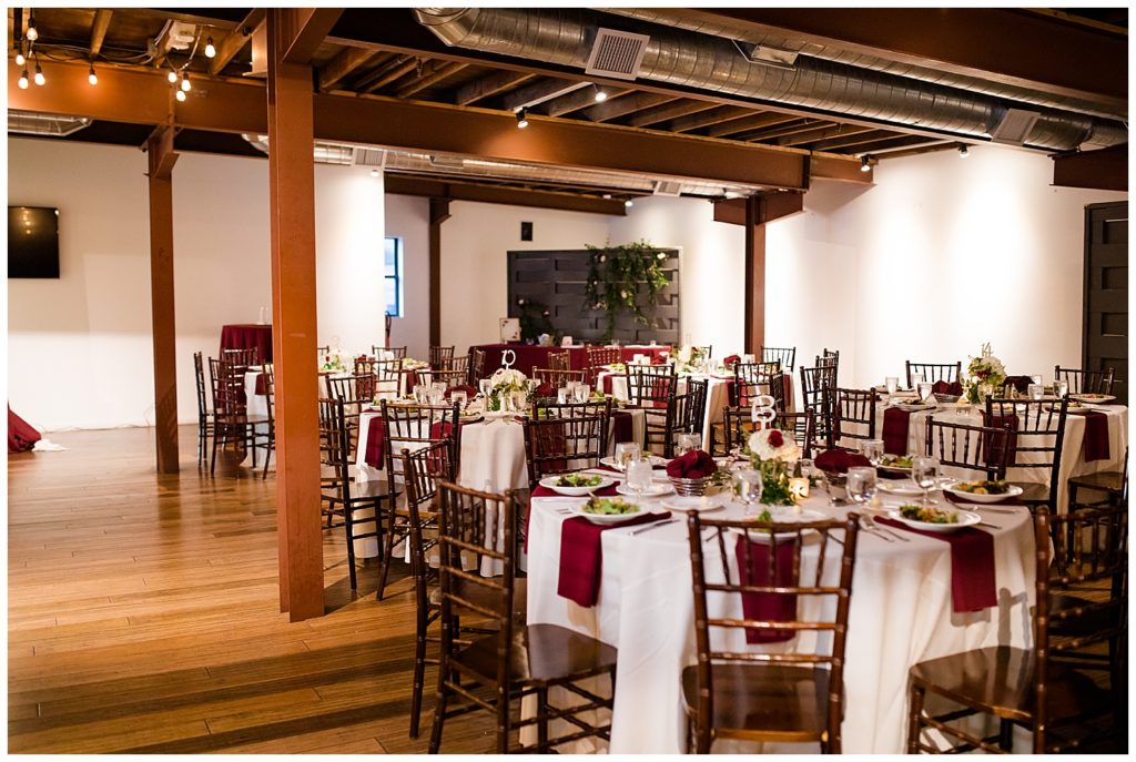 round tables set up for reception at copius