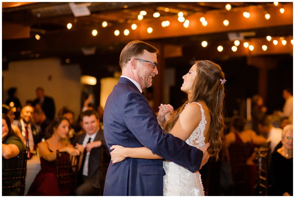 father and bride share dance at copius