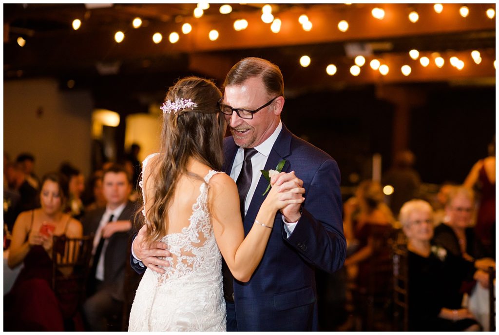 bride and father dancing at copius