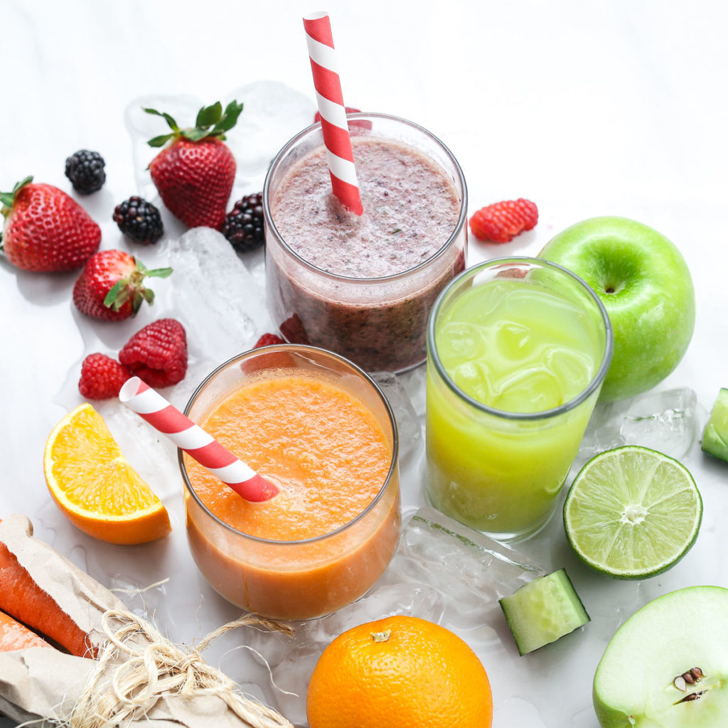 orange, green, and berry smoothies