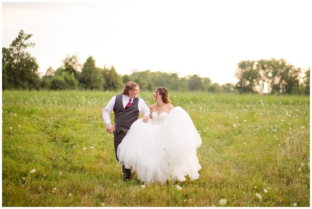 bride and groom during golden hour at brookside